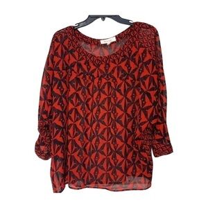 Vince Camuto black and red flowing blouse. Gorgeous and versatile.